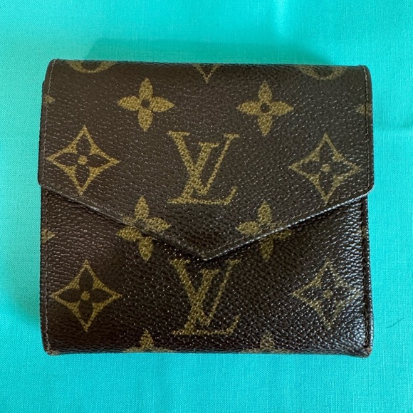 Louis Vuitton Double. Snap Monogram Wallet - Picture 2 of 14